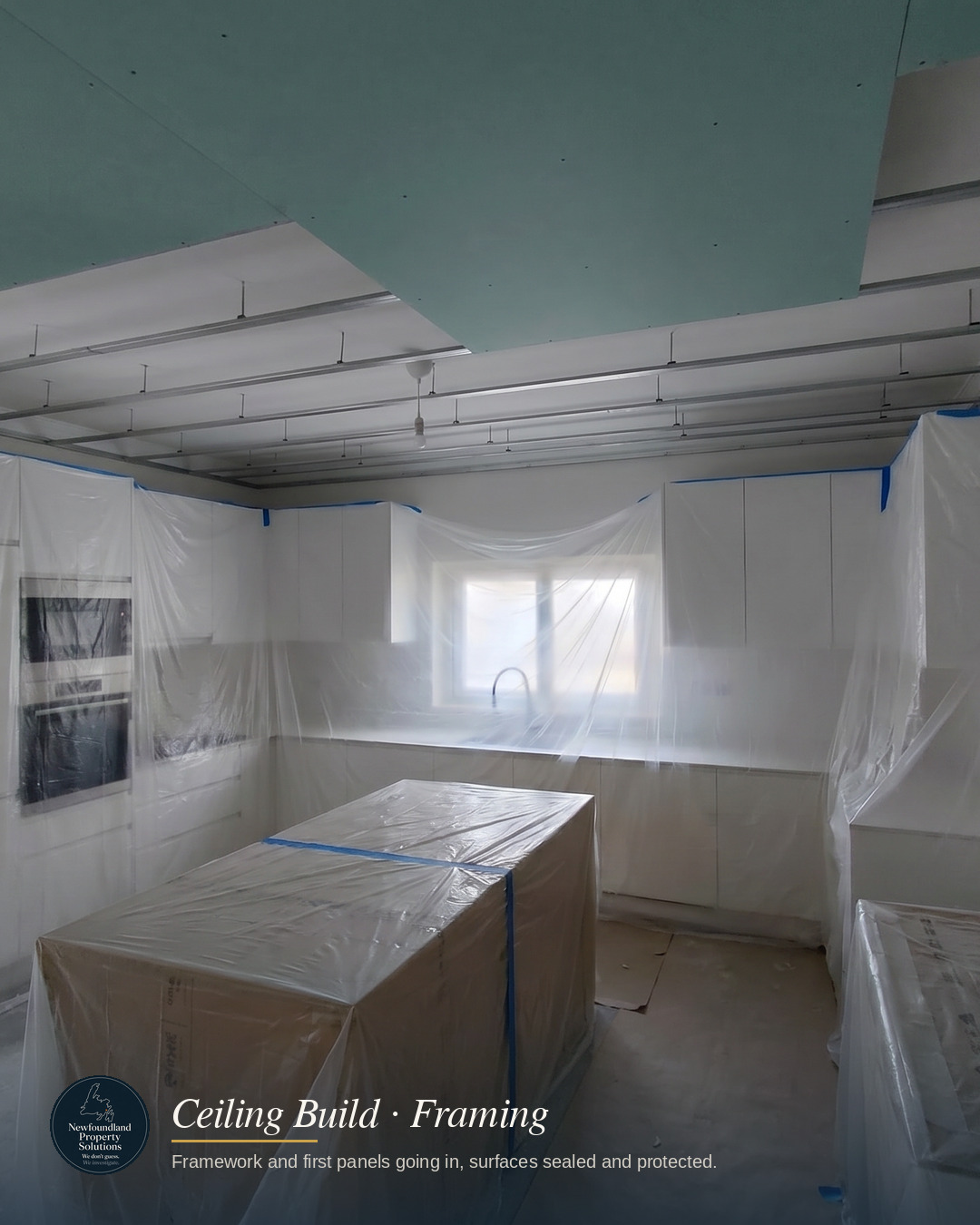 Ceiling framework and first panels going in